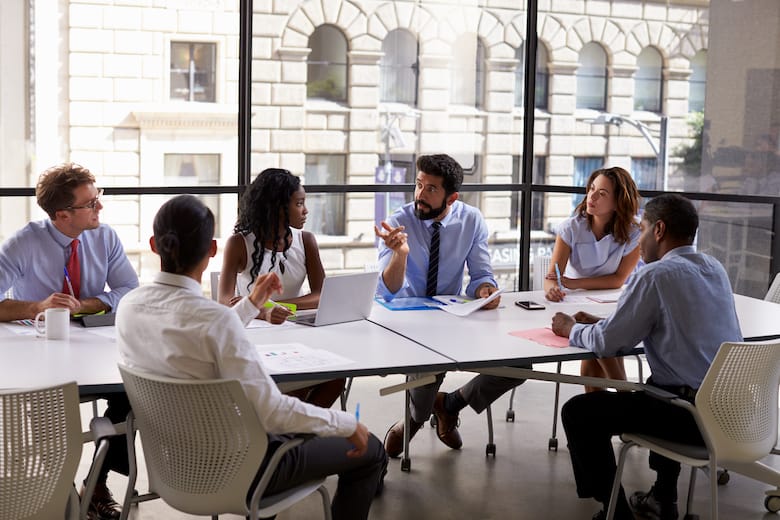 people working in office to discuss product launch